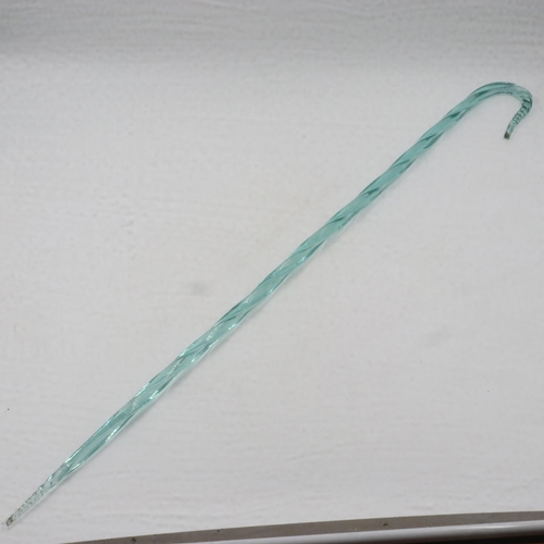 276 - Victorian twisted glass cane, L: 95cm, chip to each end. Not available for in-house P&P