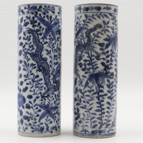 294 - Pair of Kangxi period cylindrical vases, each decorated with dragons amongst foliage, H: 25cm, one e... 