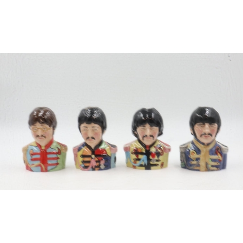 242 - Set of four Beatles character jugs, Sgt. Peppers limited edition, no. 544, H: 14 cm. UK P&P Group 3 ... 