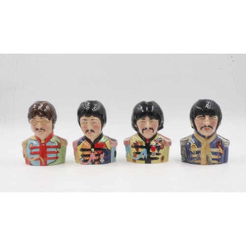 242 - Set of four Beatles character jugs, Sgt. Peppers limited edition, no. 544, H: 14 cm. UK P&P Group 3 ... 