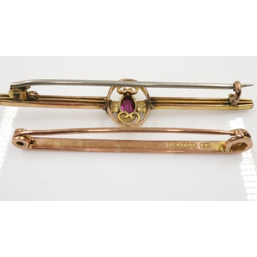 10 - Two 9ct gold bar brooches, one set with amethyst and seed pearl, combined 3.8g. UK P&P Group 0 (£6+V... 