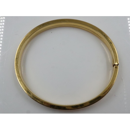 3 - 9ct gold snap bangle with textured decoration, 60 x 65 mm, 11.7g. UK P&P Group 0 (£6+VAT for the fir... 