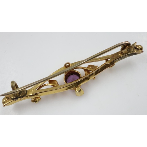 43 - Victorian Chester hallmarked 18ct gold bar brooch set with amethyst and split pearl, L: 45 mm, 2.7g.... 