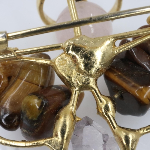 5 - Unusual unmarked gold pendant, set with tigers eye rock crystal and moonstone in the form of an ange... 