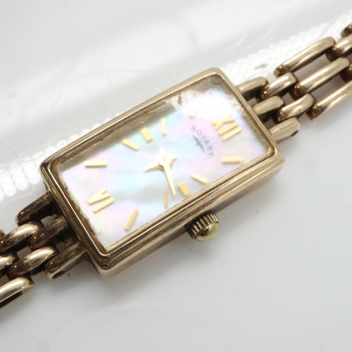 64 - ROTARY: ladies 9ct gold cased wristwatch on 9ct gold bracelet, mother of pearl dial, requires batter... 