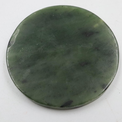 86 - Oriental carved jade circular disc, D: 50 mm. UK P&P Group 1 (£16+VAT for the first lot and £2+VAT f... 