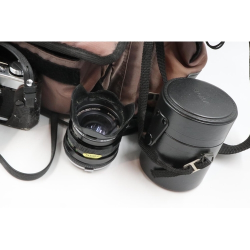 122 - Olympus OM1 camera with two Sigma lenses and flash unit. UK P&P Group 1 (£16+VAT for the first lot a... 