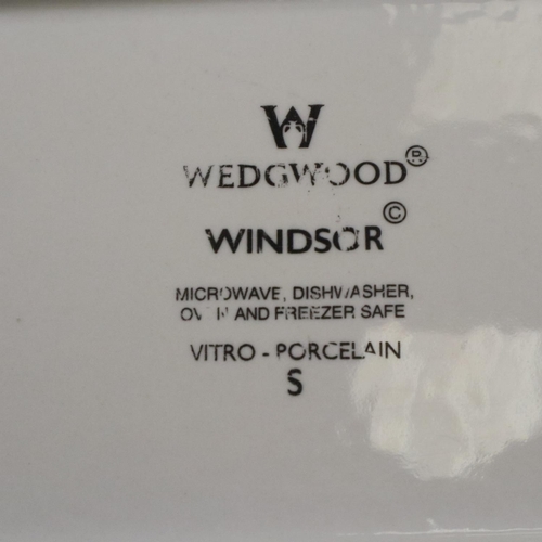 221 - Wedgwood dinnerware of eight pieces in the Windsor pattern, including serving dishes, tea pot, salad... 