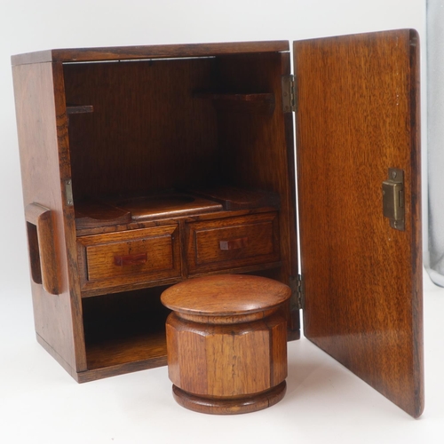 322 - Fitted oak smokers cabinet with covered wooden tobacco jar, H: 32, W: 26 cm. Not available for in-ho... 