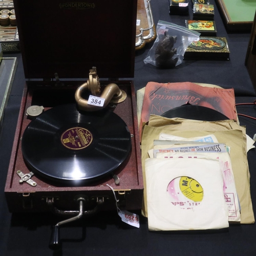 384 - Wondertone portable gramophone and collection of 78 and 45 RPM singles including George Formby and T... 