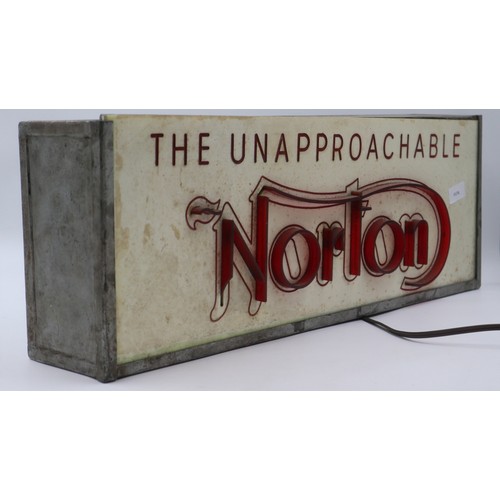 107A - Norton Motorcycles 'The Unapproachable Norton' advertising box sign, 64 x 13 x 24cm. Not available f... 