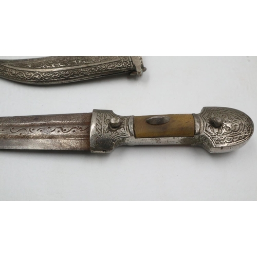 2046 - Middle Eastern jambiya with white metal fittings and scabbard, blade, L: 16 cm. UK P&P Group 2 (£20+... 