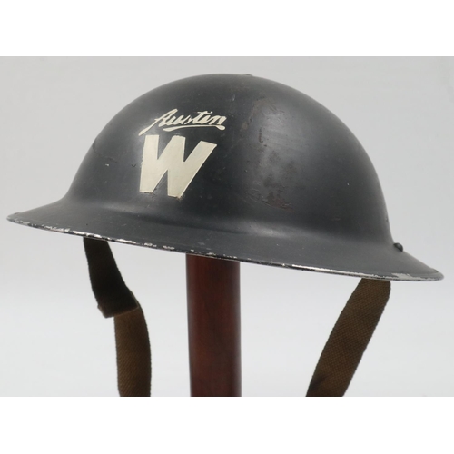 2188 - British Home Front Brodie helmet, warden at the Austin factory, with liner and chinstrap present. UK... 