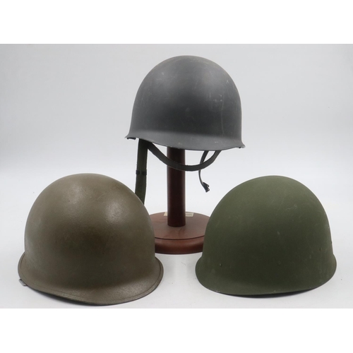 2191 - Two replica American helmets each with liners and a further liner (3). UK P&P Group 3 (£30+VAT for t... 