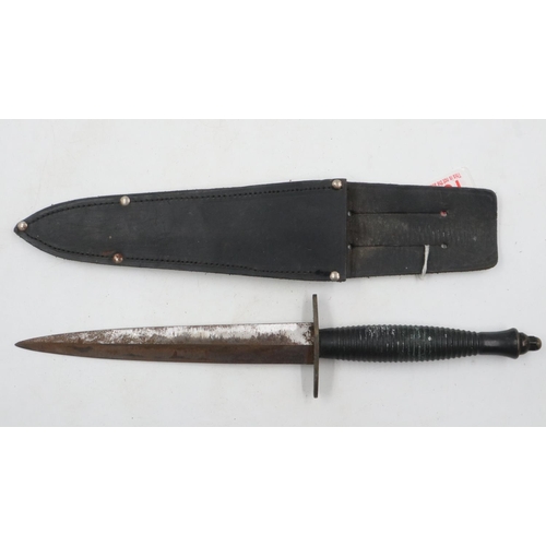 2258 - British Commando dagger and leather sheath. UK P&P Group 1 (£16+VAT for the first lot and £2+VAT for... 