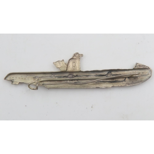 2303 - WWII German Kriegsmarine U-9 Propaganda badge. These were made to commemorate Wolfgang Luth, the com... 