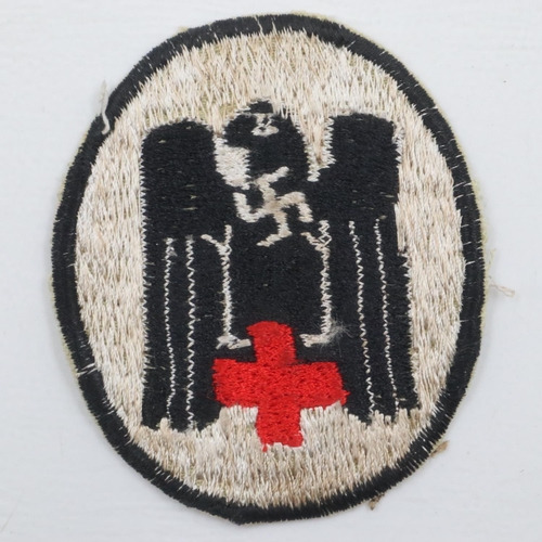 2220 - WWII German DRK German Red Cross Sports Vest Badge. UK P&P Group 1 (£16+VAT for the first lot and £2... 