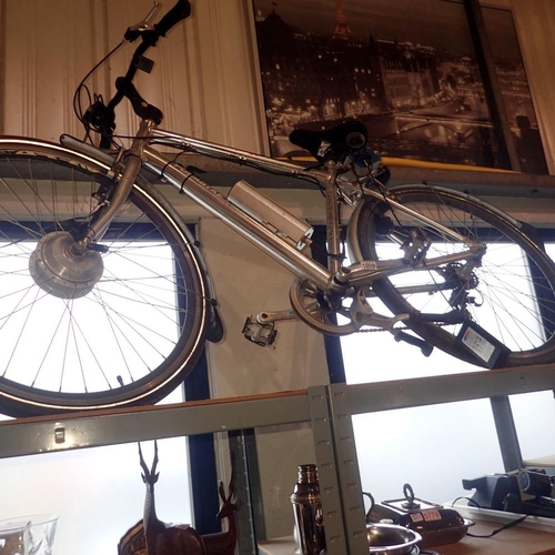 1009 - Silver Powabyke with cable and charger, 22 inch frame, 27 inch wheels. Not available for in-house P&... 