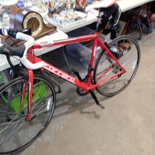 1011 - Red Carrera bicycle with 22 inch frame, 27 inch wheels. Not available for in-house P&P