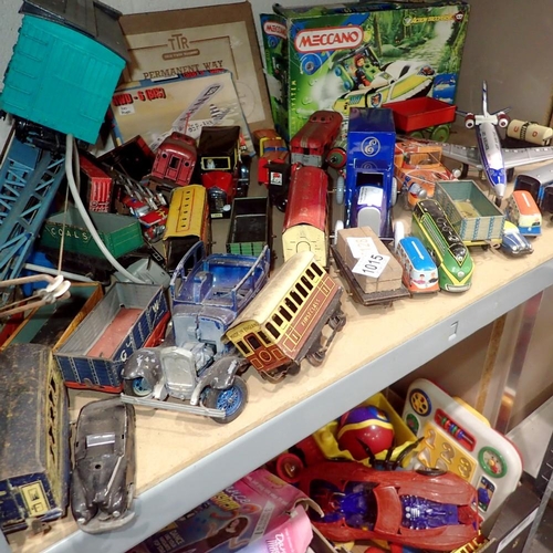 1015 - Shelf of tin plate toys, including cars and trains. Not available for in-house P&P