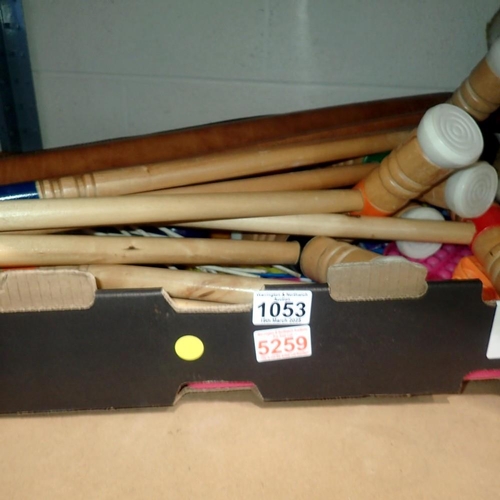 1053 - Box of mixed items including two pool cues, croquet set, Xbox controller an d toys. Not available fo... 