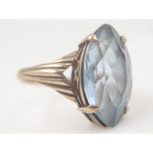 18 - 9ct gold solitaire ring set with a large marquis-cut aquamarine, size N/O, 4.8g. UK P&P Group 0 (£6+... 