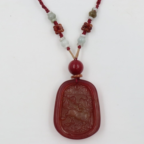 43 - 20th century carved red jade pendant, on a strung necklace further beaded with jade. UK P&P Group 1 ... 