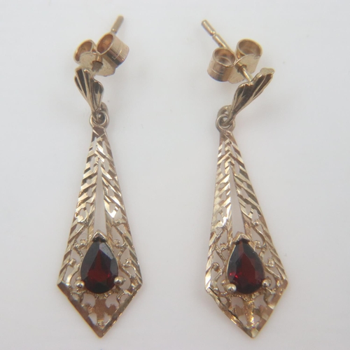 7 - 9ct gold pair of garnet set drop earrings, combined 1.6g. UK P&P Group 0 (£6+VAT for the first lot a... 