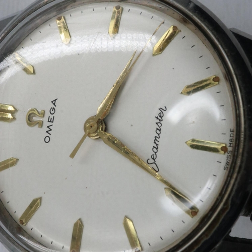 65 - OMEGA: Seamaster gents steel cased automatic wristwatch on an expanding bracelet, working at lotting... 