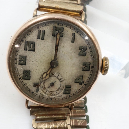 66 - 1920s 9ct gold cased wristwatch on a rolled gold bracelet, not working at lotting. UK P&P Group 1 (£... 