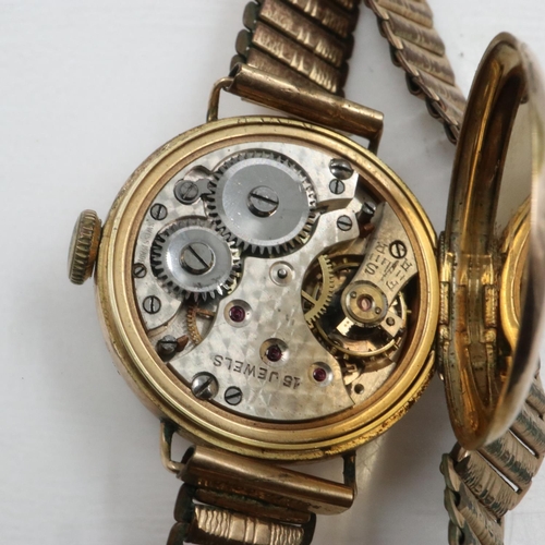 66 - 1920s 9ct gold cased wristwatch on a rolled gold bracelet, not working at lotting. UK P&P Group 1 (£... 