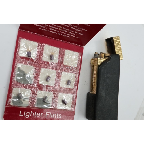 92 - Dunhill gold plated lighter with cover and spare flint. UK P&P Group 1 (£16+VAT for the first lot an... 