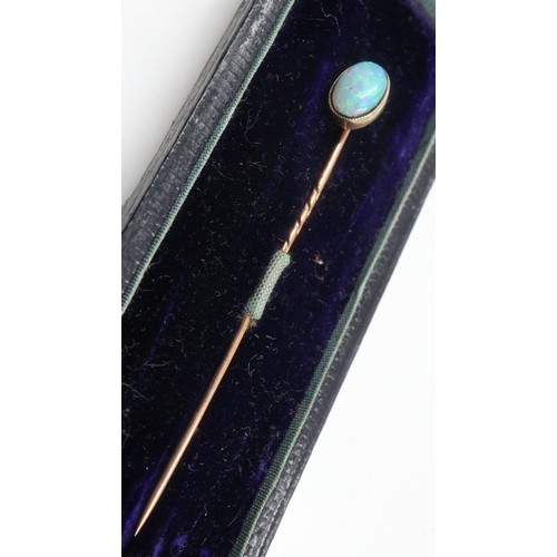 48 - Boxed 9ct gold pin surmounted with an opal, 1.1g. UK P&P Group 0 (£6+VAT for the first lot and £1+VA... 