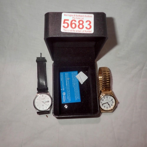 1203 - Two wristwatches, Citezen day date and Timex Optics. UK P&P Group 1 (£16+VAT for the first lot and £... 