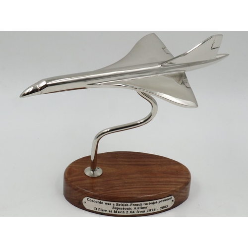 235 - Chrome Concorde on wooden base. UK P&P Group 2 (£20+VAT for the first lot and £4+VAT for subsequent ... 