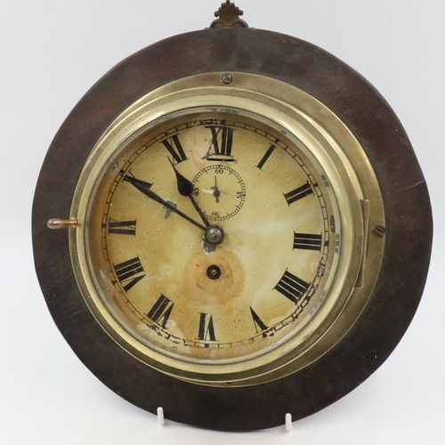 257 - Marine brass cased Porthole clock mounted on oak, clock D: 20 cm. UK P&P Group 3 (£30+VAT for the fi... 