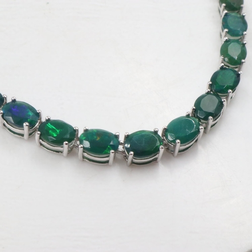 54A - Silver necklace set with thirty five green opals, 23g. UK P&P Group 1 (£16+VAT for the first lot and... 