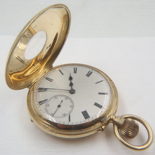 137 - 18ct gold half hunter pocket watch with enamelled Roman numerals to the case, not working at lotting...