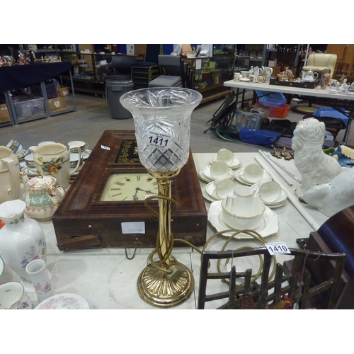 1411 - Brass and glass table lamp. The light functionality is intact. All electrical items in this lot have... 