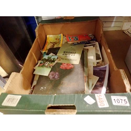 1075 - Quantity of postcards and a stamp albums. Not available for in-house P&P