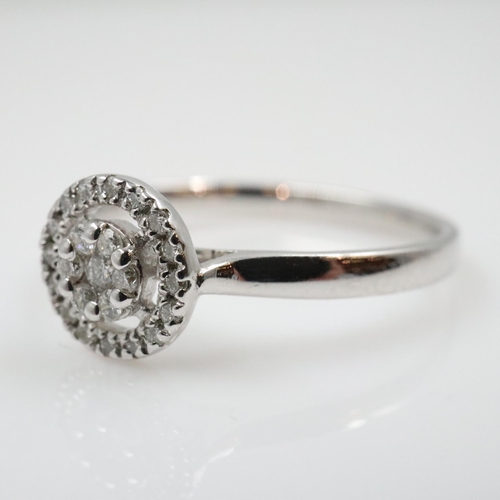 24 - 9ct white gold diamond halo-set cocktail ring, size O, 2.0g. UK P&P Group 0 (£7+VAT for the first lo... 