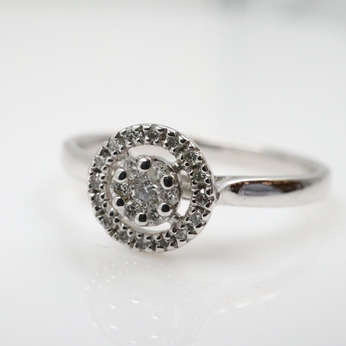 24 - 9ct white gold diamond halo-set cocktail ring, size O, 2.0g. UK P&P Group 0 (£7+VAT for the first lo... 