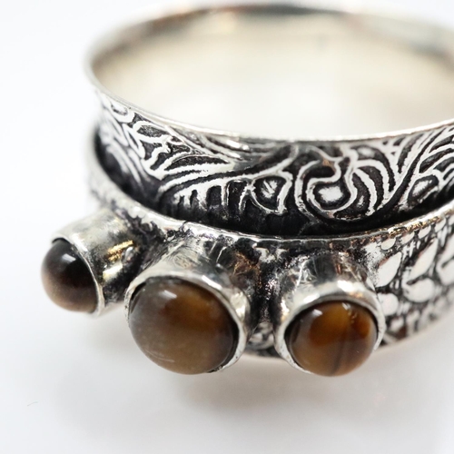 30 - Sterling silver and tigers eye set swivel ring, size T. UK P&P Group 0 (£7+VAT for the first lot and... 
