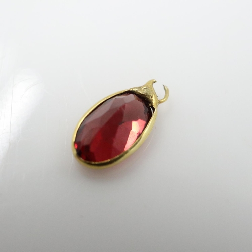 44 - 9ct gold bezel set garnet charm pendant. UK P&P Group 0 (£7+VAT for the first lot and £1+VAT for sub... 