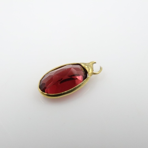 44 - 9ct gold bezel set garnet charm pendant. UK P&P Group 0 (£7+VAT for the first lot and £1+VAT for sub... 