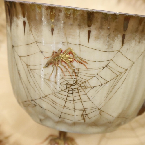 119 - Limoges tea service in the toiles d'araignées pattern, with cream and gold ground decorated with spi... 