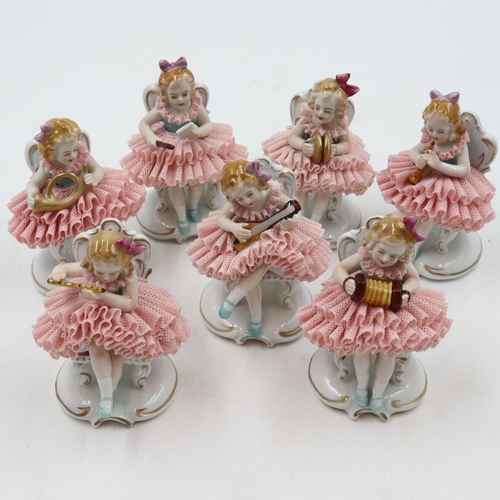 125 - Seven 20th century Sitzendorf seated ballerina band figurines, some minor losses, H: 11 cm. UK P&P G... 