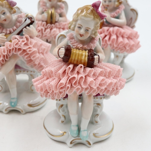125 - Seven 20th century Sitzendorf seated ballerina band figurines, some minor losses, H: 11 cm. UK P&P G... 