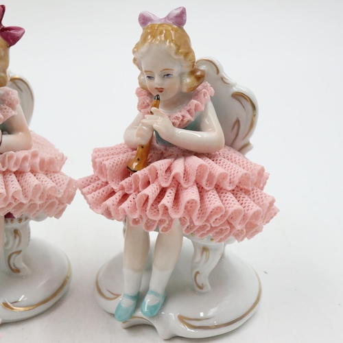125 - Seven 20th century Sitzendorf seated ballerina band figurines, some minor losses, H: 11 cm. UK P&P G... 