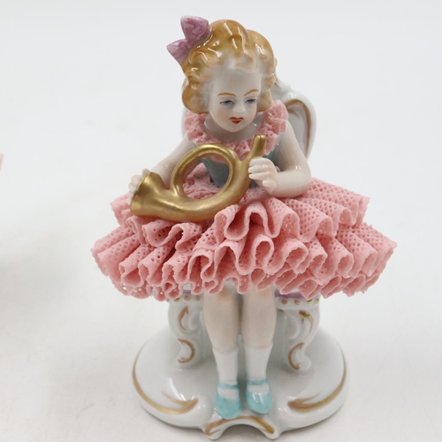 125 - Seven 20th century Sitzendorf seated ballerina band figurines, some minor losses, H: 11 cm. UK P&P G... 